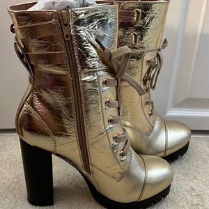 Gold Heel Lace up boots.